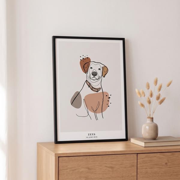 Line Art portret in een zwarte lijst op een dressoir